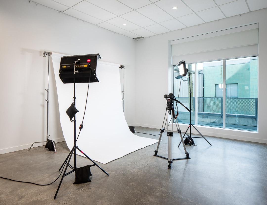 Photo studio with backdrop and lighting rig