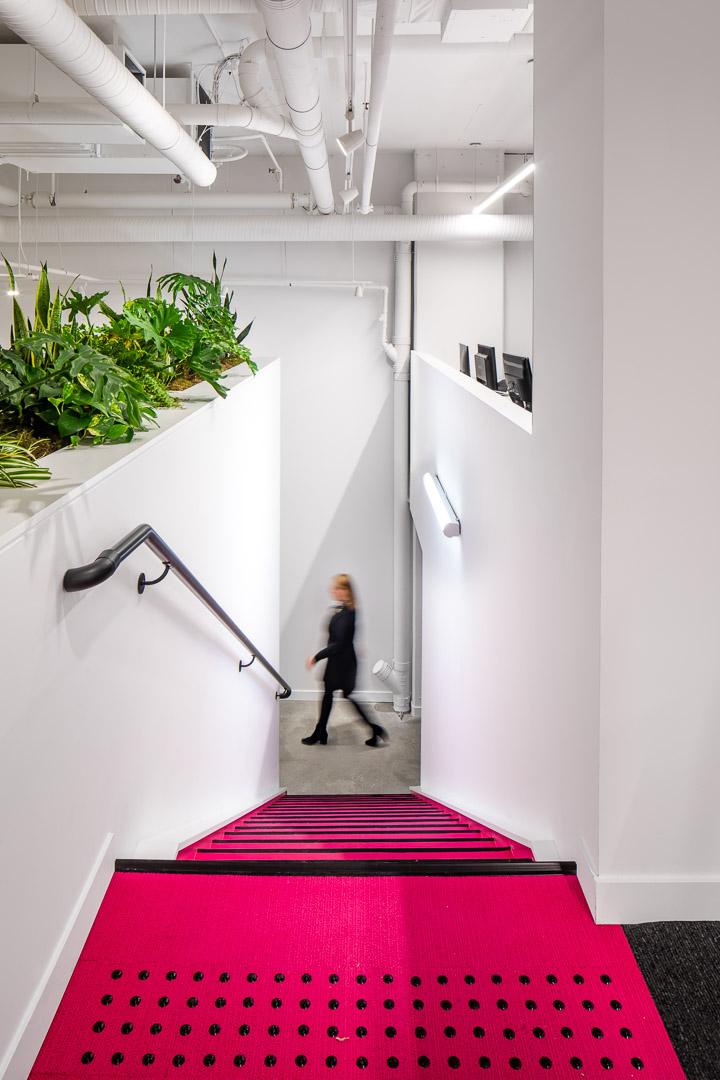 Stairs connecting the mezzanine to the main floor