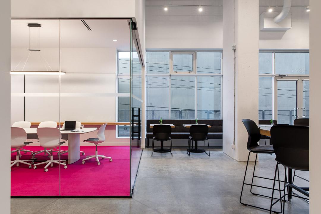 The boardroom's glass box, framed by the open floor